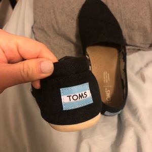 Toms black slip on shoes, great condition